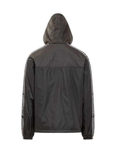 Shop Versace Hooded Windbreaker Jacket In Black
