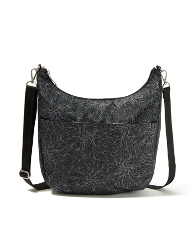 Shop Baggallini Lunar Half Moon Crossbody In Midnight Blossom Print