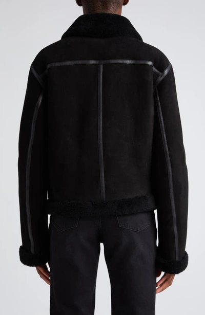 Shop Totême Genuine Shearling Aviator Jacket In Black