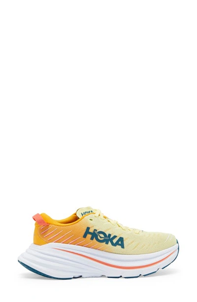 Shop Hoka Bondi X Running Shoe In Yellow Pear / Radiant Yellow