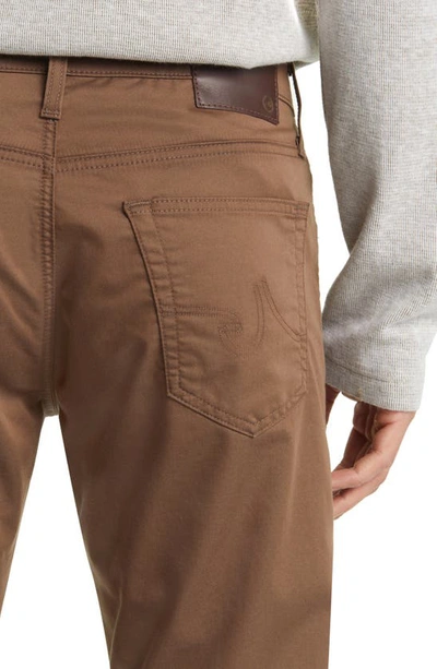 Shop Ag Everett Commuter Performance Slim Straight Sateen Pants In Baked Cumin