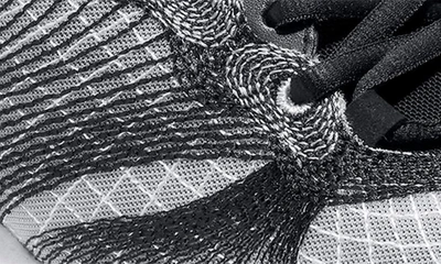 Shop Cole Haan 5.zerogrand Embrostitch Running Shoe In Black/ Gray Pinstripe/ Optic