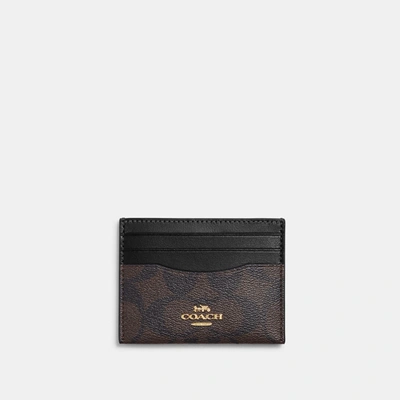 Shop Coach Outlet Slim Id Card Case In Signature Canvas In Brown