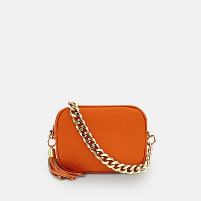 Shop Apatchy London Orange Leather Crossbody Bag With Gold Chain Strap