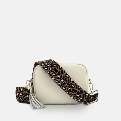 Shop Apatchy London Stone Leather Crossbody Bag With Tan Cheetah Strap In White