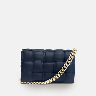 Shop Apatchy London Navy Padded Woven Leather Crossbody Bag With Gold Chain Strap In Blue