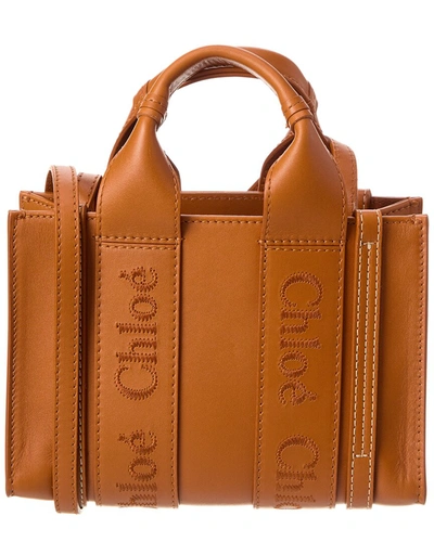 Shop Chloé Woody Mini Leather Tote In Orange