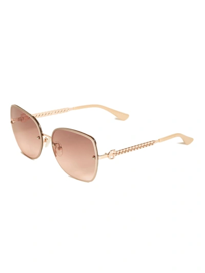 Shop Guess Factory Logo Chain Sunglasses In Beige