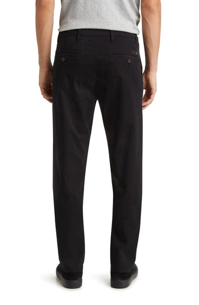Shop Ag Kullen Flat Front Stretch Sateen Chinos In Black