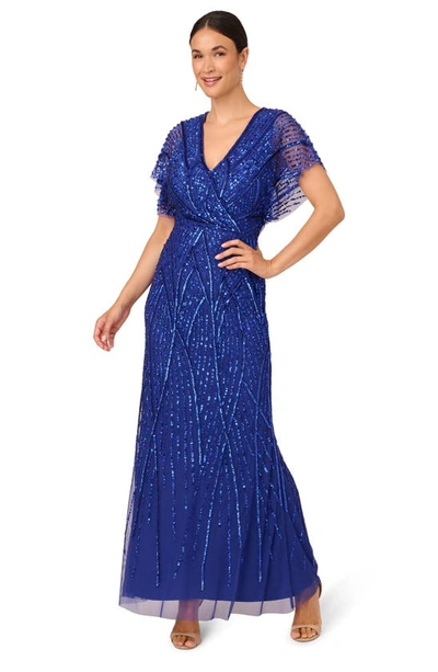 Shop Adrianna Papell Beaded Sequin Surplice Trumpet Gown In Ultra Blue