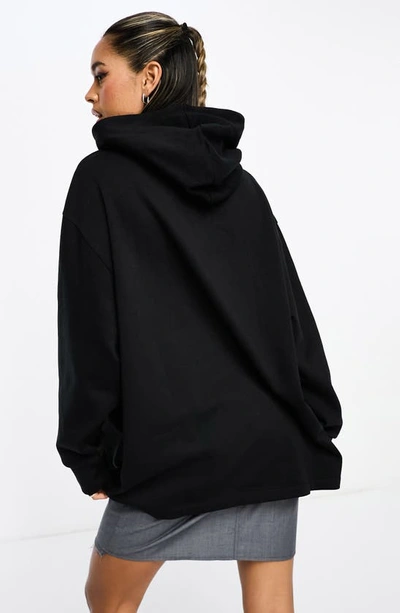 Shop Asos Design Paris Cotton Graphic Hoodie In Black