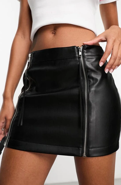Shop Asos Design Faux Leather Miniskirt In Black
