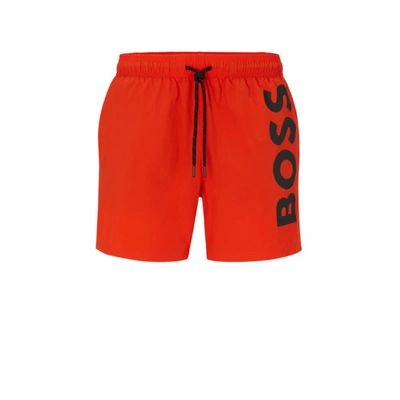 Shop Hugo Boss Quick-dry Swim Shorts With Large Logo Print In Orange