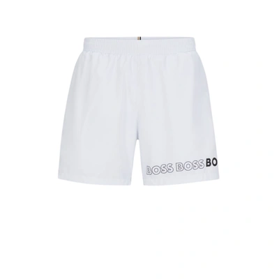 Shop Hugo Boss Swim Shorts With Repeat Logos In White
