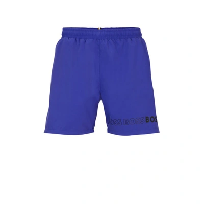 Shop Hugo Boss Swim Shorts With Repeat Logos In Blue