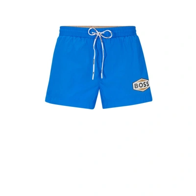 Shop Hugo Boss Quick-drying Swim Shorts With Logo Details In Blue