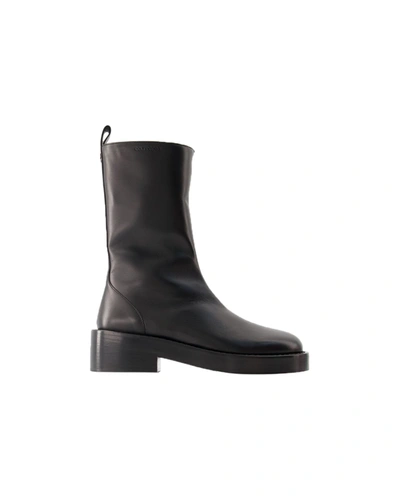 Shop Courrèges Zipped Ankle Boots - Courreges - Leather - Black