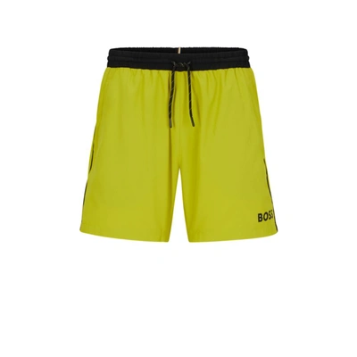 Shop Hugo Boss Contrast-logo Swim Shorts In Yellow