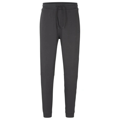 Shop Hugo Boss Cotton-terry Tracksuit Bottoms With Logo Patch In Grey