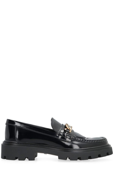 Shop Tod's Logo Plaque Chunky Loafers In Black