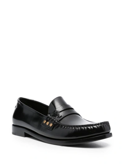 Shop Saint Laurent Almond-toe Leather Loafers In Black