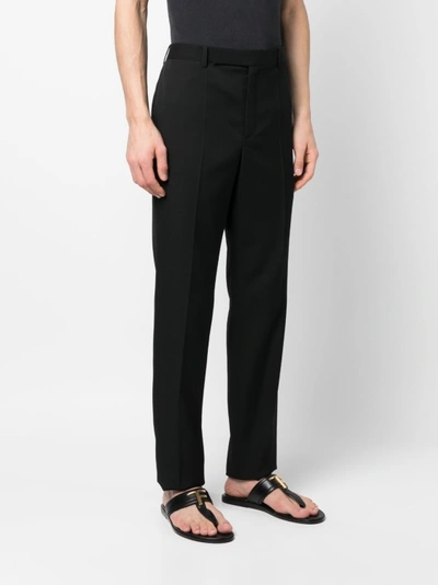 Shop Saint Laurent Straight Trousers With Marked Pleats In Black