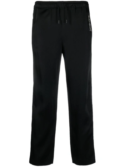 Shop Saint Laurent Striped Logo-embroidered Joggers In Black