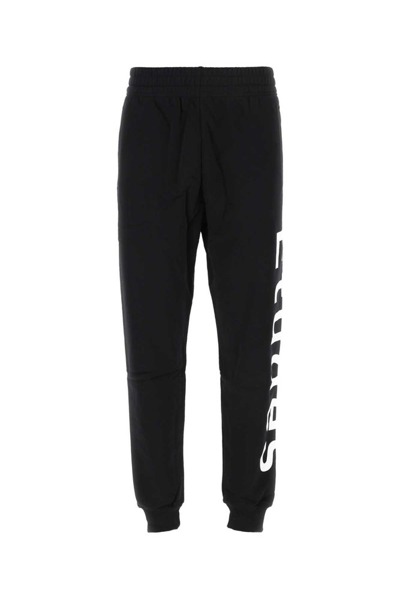 Shop Etudes Studio Etudes Logo Printed Tapered Leg Pants In Black