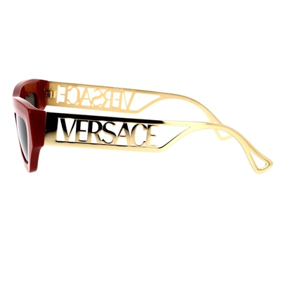Shop Versace Sunglasses In Red