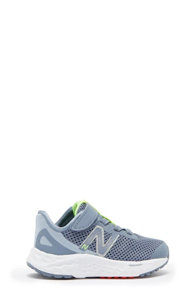 Shop New Balance Kids' Fresh Foam Arishi V4 Sneaker In Arctic Grey/ Pixel Green