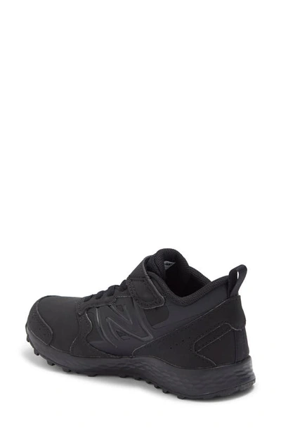Shop New Balance Kids' 650 Sneaker In Black/ Black