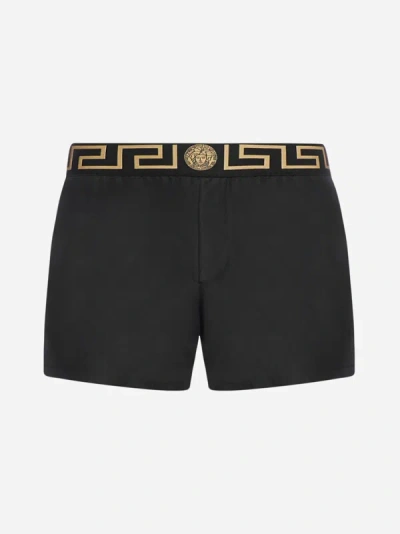Shop Versace Medusa And Greca Swim Shorts In Black,gold