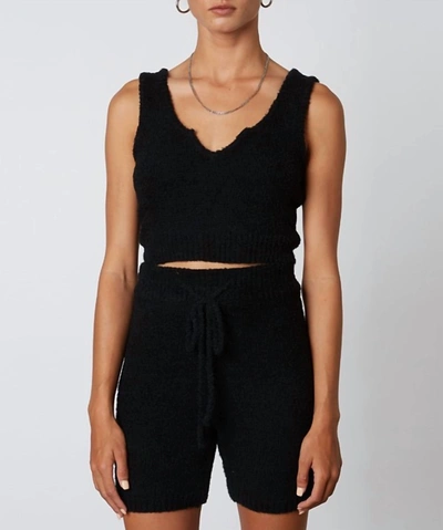 Shop Nia Mid-length Sweater Short In Black