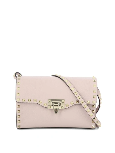 Shop Valentino Garavani "small Rockstud" Crossbody Bag In Pink