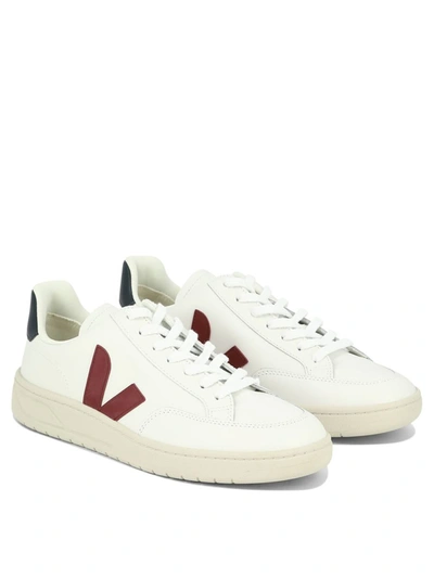 Shop Veja "v-12" Sneakers In White