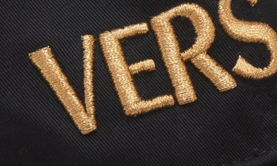 Shop Versace Embroidered Metallic Logo Cotton Drill Baseball Cap In Black Gold