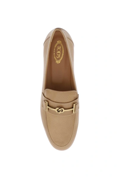 Shop Tod's Leather Loafers With Bow Women In Cream