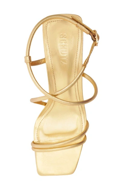 Shop Schutz Aimee Strappy Sandal In Ouro Claro Orch