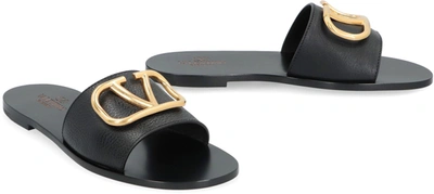 Shop Valentino Garavani - Leather Slides With Logo In Black