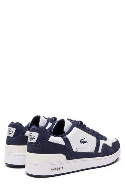 Shop Lacoste T-clip Sneaker In 042 Wht/ Nvy