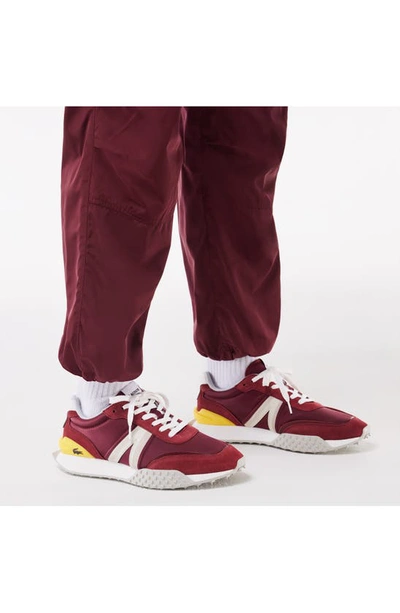 Shop Lacoste L-spin Deluxe Sneaker In Burgundy/ White