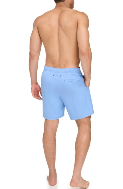 Shop Calvin Klein Solid Stretch Board Shorts In Light Blue