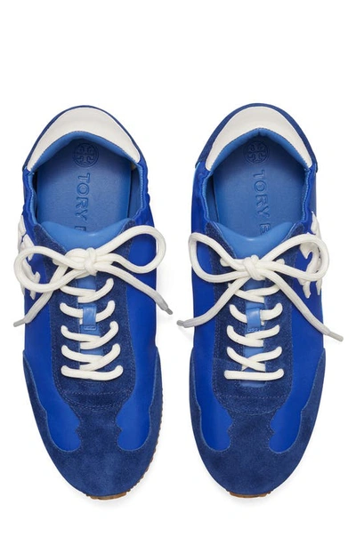 Shop Tory Burch Tory Sneaker In Travial Blue/ New Ivory