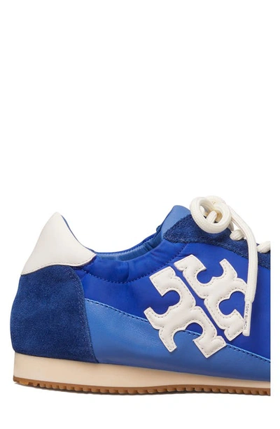 Shop Tory Burch Tory Sneaker In Travial Blue/ New Ivory