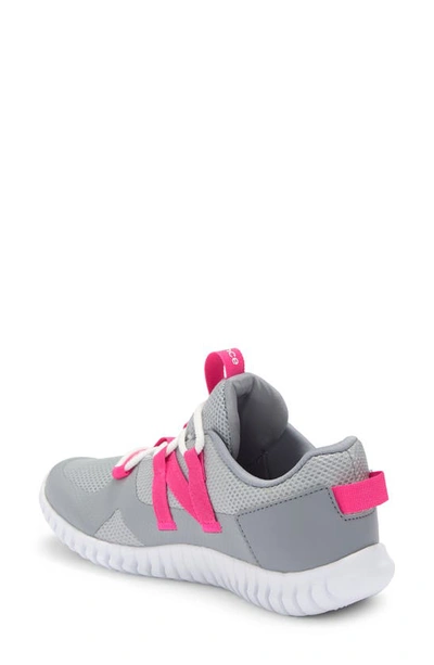 Shop New Balance Kids' Play Gruv Sneaker In Grey/ Hi-pink