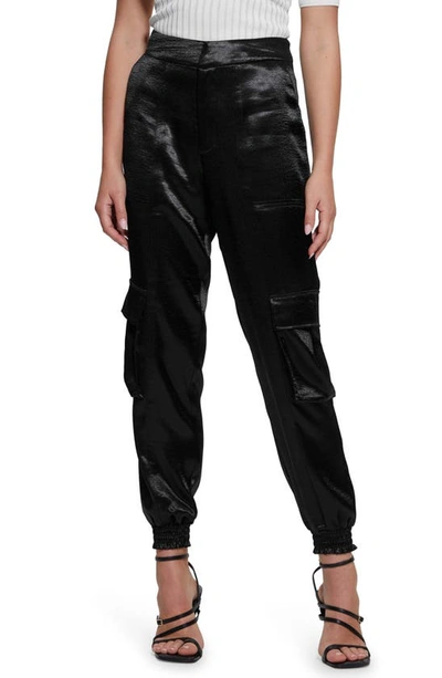 Shop Guess Soundwave Textured Satin Cargo Pants In Jet Black