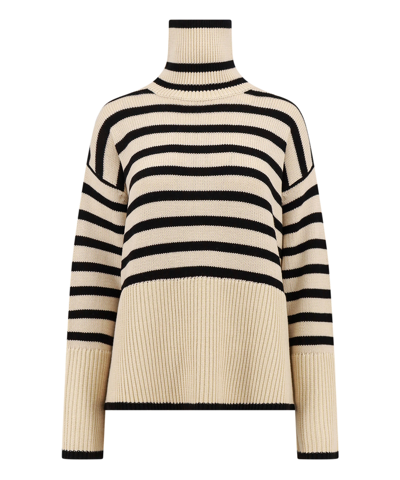 Shop Totême Oversize Roll-neck Sweater In Beige