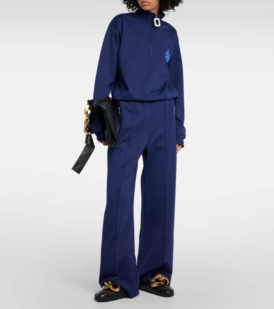 Shop Jw Anderson Bootcut Track Pants In Blue