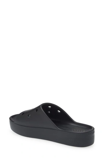 Shop Crocs Classic Platform Slide Sandal In Black