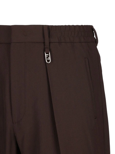 Shop Fendi Trousers In Brown